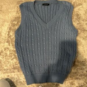 Nice. Rarely worn sweater vest